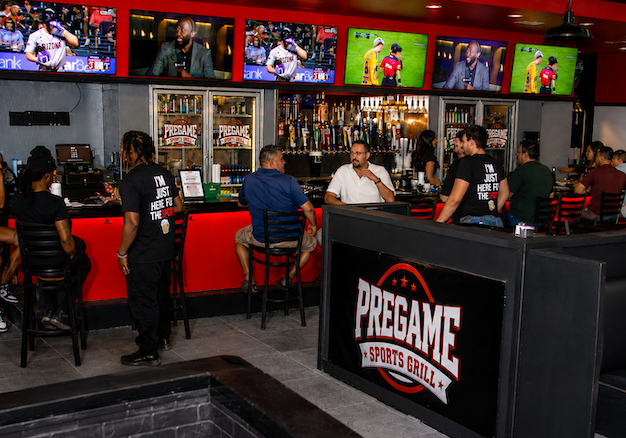 Friends and family soft opening guests at the bar